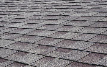 Doehole tiles for shallow pitch roofing